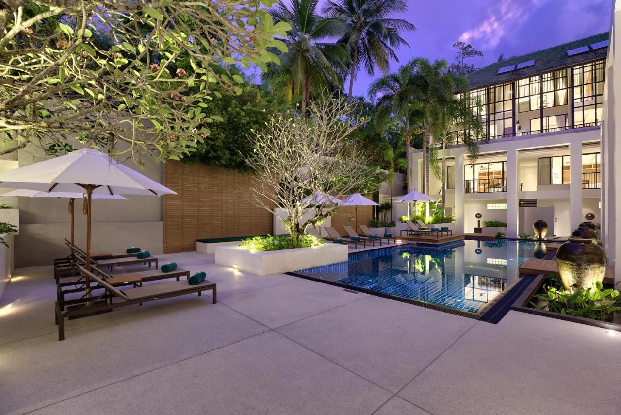 Outrigger Surin Beach Resort - Sha Extra Plus Praia de Surin Exterior foto The hotel's pool