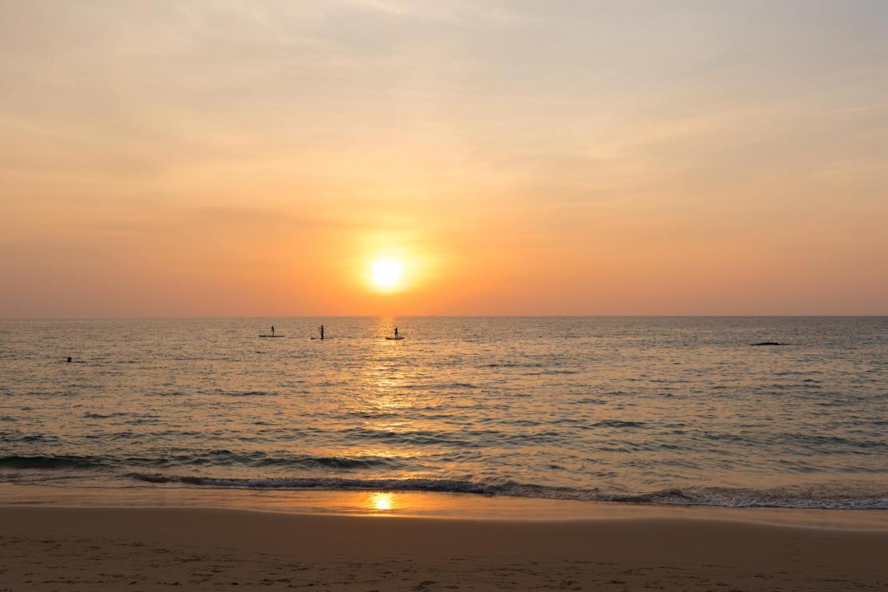 Outrigger Surin Beach Resort - Sha Extra Plus Praia de Surin Exterior foto Sunset at the beach