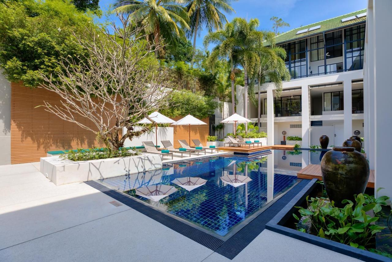 Outrigger Surin Beach Resort - Sha Extra Plus Praia de Surin Exterior foto The swimming pool at the hotel