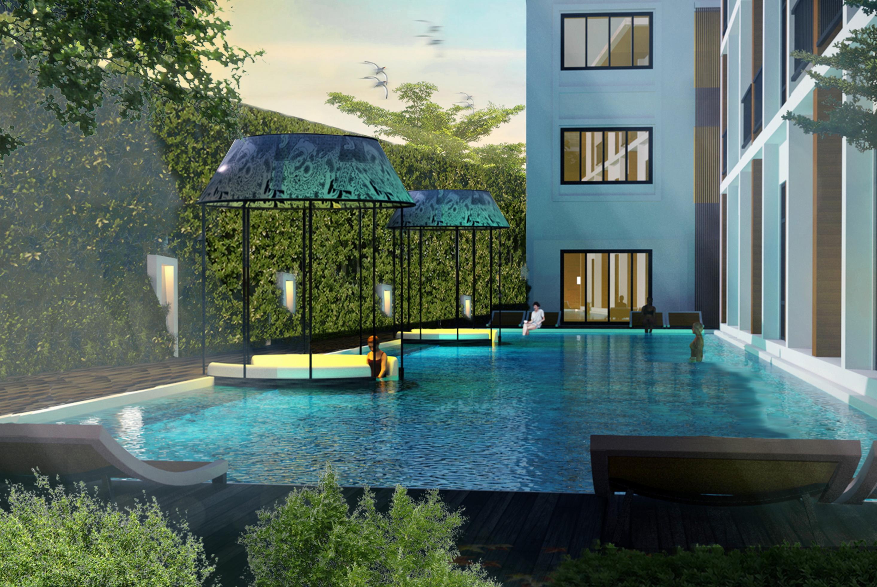 Outrigger Surin Beach Resort - Sha Extra Plus Praia de Surin Exterior foto The pool at the hotel