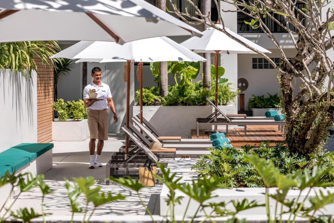 Outrigger Surin Beach Resort - Sha Extra Plus Praia de Surin Exterior foto The hotel's pool