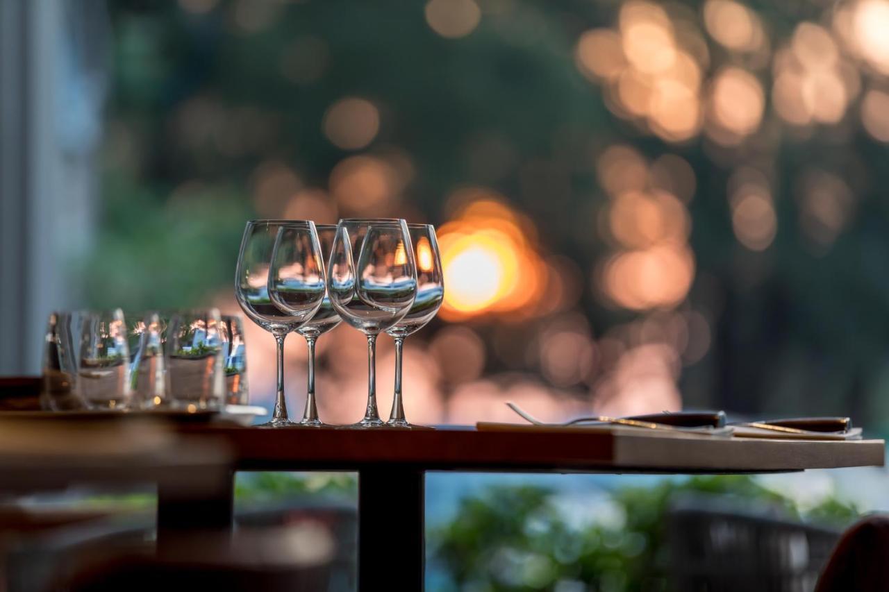 Outrigger Surin Beach Resort - Sha Extra Plus Praia de Surin Exterior foto Wine glasses