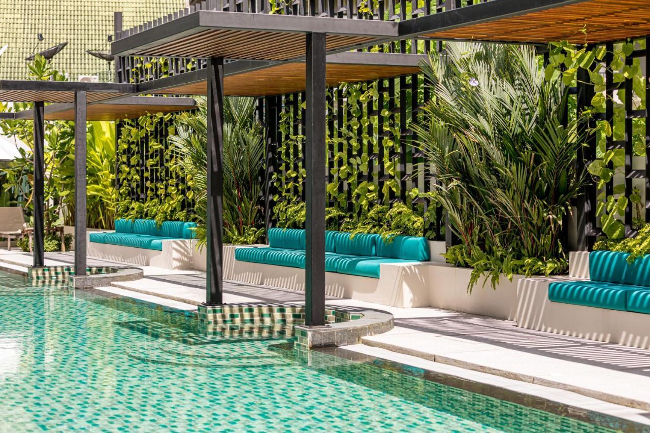 Outrigger Surin Beach Resort - Sha Extra Plus Praia de Surin Exterior foto The pool at the hotel